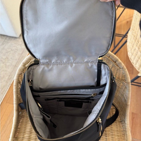 osprey daylite capacity 44L Carry-On Travel Pack - Lightweight, Durable Backpack with Streamlined Design TUMI Backpack Comparison | the versatile Osprey Daylite Color:Tin Grey Dark Heather/Asphalt Grey/TNF Black-NPF View All Accessories
